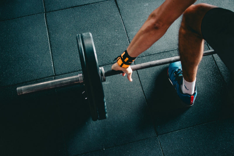 athlete lifting a barbell